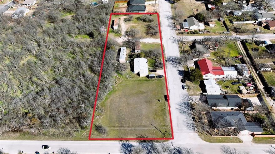 Great investment property consisting of 1.366 +- acres with a house and 3 mobile homes. None of the homes have measurable value but the land is a prime location. New homes being built in the area as well as established newer single family and some duplexes. This property is close to schools, groceries and shopping with easy access to Hwy 380.