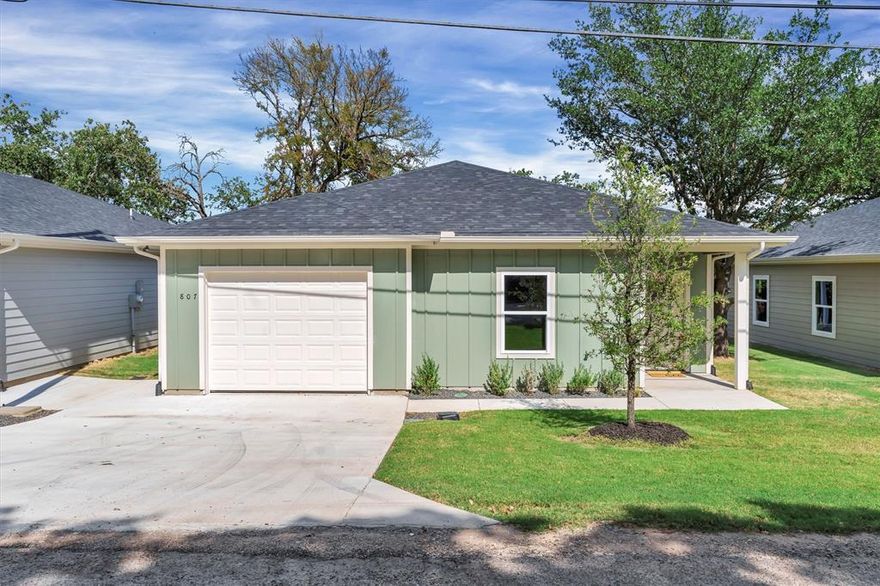 This brand-new 3-bedroom, 2-bathroom home offers 1,287 sq. ft. of modern comfort on the highly desirable Fort Worth side of Granbury, TX, making it an excellent opportunity for first-time homebuyers, investors, or buyers seeking low-maintenance new construction. Thoughtfully designed with quality upgrades throughout, the home features spray foam insulation, upgraded fixtures, stainless steel appliances, energy-efficient construction, and a fully sodded yard for immediate curb appeal. Step inside to a bright, open-concept layout that seamlessly connects the living, dining, and kitchen areas—perfect for everyday living and entertaining. The private primary suite provides a relaxing retreat, while two additional bedrooms offer flexibility for guests, family, or a home office. Located in the sought-after Western Hills Harbor community, residents enjoy resort-style neighborhood amenities including a private boat launch, fishing pier, community swimming pool, neighborhood park, and lake access to Lake Granbury, creating the ideal setting for boating, fishing, and outdoor recreation. Conveniently situated just minutes from shopping, dining, Historic Granbury Square, and an easy commute to Fort Worth, this home delivers the perfect combination of new construction value, lake-community living, and everyday convenience.
