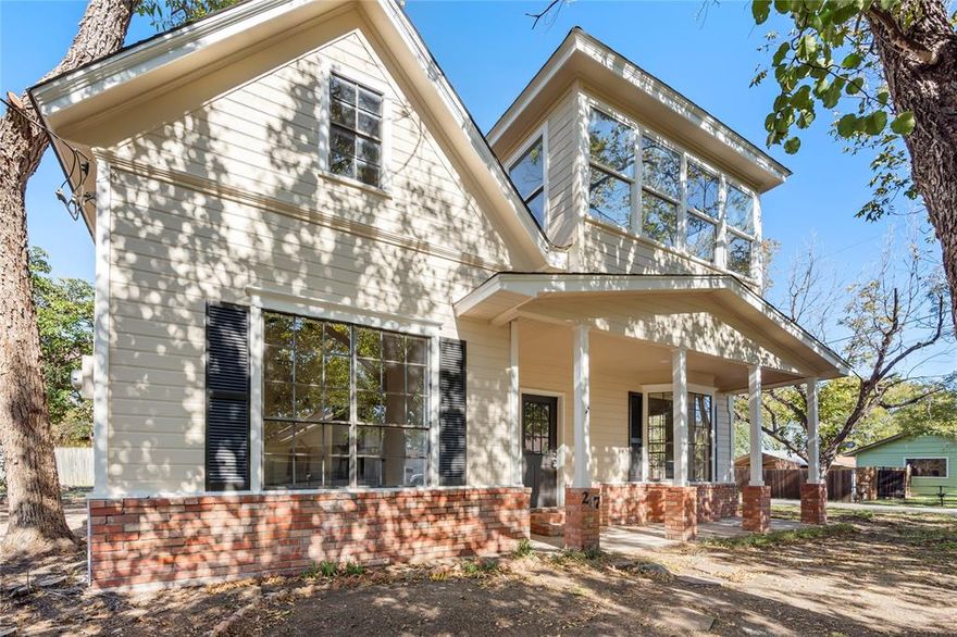 Charming home built in 1910 is beckoning you to live the small town life! Tucked away under the trees on a corner lot and full of space and natural light.  Versatile layout with 3 bedrooms, each having it's own ensuite bathroom, is perfect for privacy or even multi generational living. Kitchen features all new cabinets, appliances, and quartz countertops with a connecting dining area.  2 full bedrooms on the downstairs floor with ensuite bathrooms.  Upstairs was designed for privacy with it's own living area, built in desk cabinetry, walk in closet with 2 additional storage closets, and a full bath. Some of the major items completed such as new roof, water heater, and HVAC.  Located only 45 mins South of Dallas and a short drive to I35!