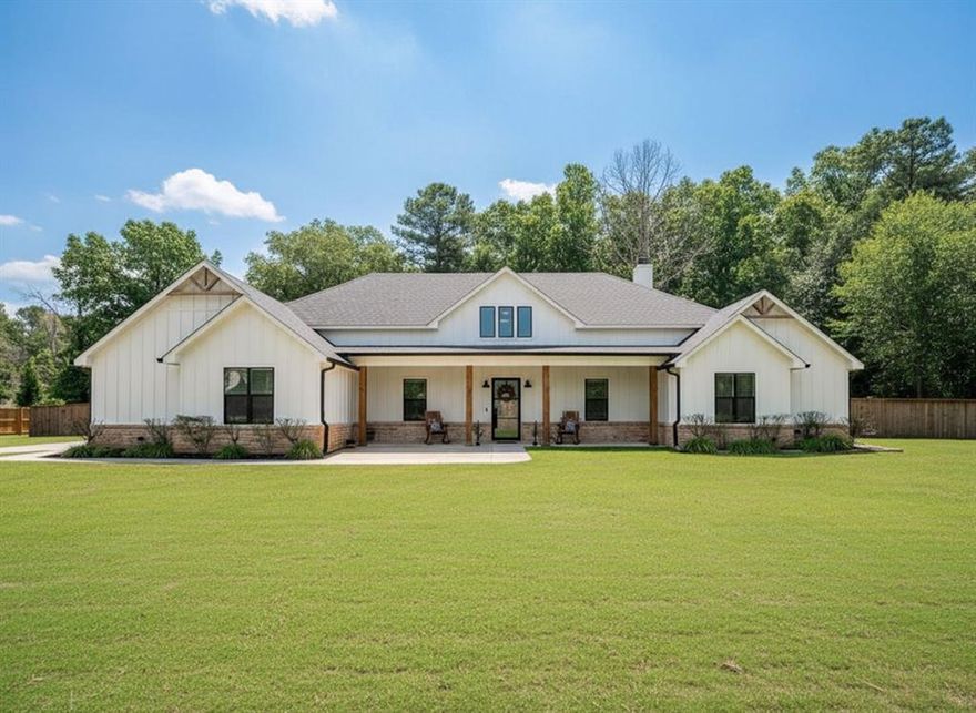 Experience the best of both worlds in this stunning 4 bedroom, 3 bath estate situated in a premier equine subdivision. Whether you’re an avid rider taking advantage of the community barn and paddocks, or an angler ready to cast a line in the stocked lake, this property offers a lifestyle of recreation and relaxation all with easy access to I20 and a short drive to the heart of Dallas. Step through the front door and be greeted by a breathtaking wall of windows that frames your private pool like a piece of art. The interior radiates rustic sophistication, featuring  Massive wooden beams in the dining area and a primary suite boasting a cathedral ceiling with shiplap accents. The Chef’s Kitchen: An open concept dream with double ovens, a classic farm sink, crown molding, and a walk in pantry. Storage is a priority here, from the built in silverware dividers to the hidden storage tucked under the massive island.  Beyond the bedroom lies a spa like bath with leathered granite and a versatile bonus room perfect for a private gym, nursery, or home office.  The backyard is an entertainer's paradise. The covered patio features a warm wood ceiling, overlooking a sparkling swimming pool with a waterfall feature. The property’s crown jewel is the multi purpose workshop. Fully wired for electricity and plumbed for water, the sellers currently utilize half of this space as a unique indoor pool lounge area, complete with its own covered patio. It’s the ultimate flex space for a hobbyist or someone who loves to host. Middle Bath: Features a one of a kind, must see custom sink. The home is built for efficiency with spray foam insulation and a fully floored attic for effortless storage. A dedicated mudroom with ample storage keeps the transition from the outdoors seamless.