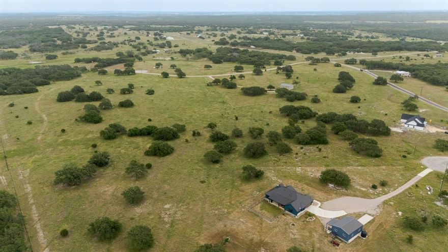 This 7.75-acre hill country property is located in the gated community of The Ranches at Blackbuck Ridge. The Ranches at Blackbuck Ridge offers stunning views and abundant wildlife. Invest for the future or start building your dream home now. This lot is located about an hour northwest of Austin and just 20 minutes from downtown Lampasas or Burnet, offering convenient access to shopping and dining. Nearby attractions include Inks Lake State Park, Buchanan Lake, Longhorn Cavern State Park, Colorado Bend State Park, numerous wineries, and much more. The property features a low tax rate with an additional wildlife exemption opportunity. Electric utilities are available at the street, but a well and septic system will be needed. Come take a look! I would be happy to personally give you a tour of the community and introduce you to your neighbors.