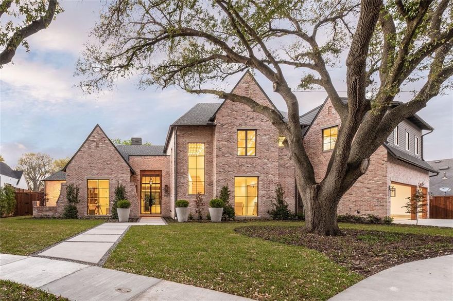 Timeless transitional design located in one of Lakewoods most coveted enclaves. Tucked away on a serene tree lined cul-de-sac steps from White Rock Lake. This breathtaking home is an is an exemplary example of the finest craftsmanship & detail you have come to expect from Fairmont Homes. Towering mature live oaks + beautiful patina through the reclaimed brick exterior creates an elegant feel. Greeted with Bevelo copper lanterns & floor to ceiling steel door. High-end sophisticated finishes throughout to be appreciated by the most discerning buyer. Grab a bottle from the wine room & entertain with over 850 sf of covered outdoor living area. Swoonworthy kitchen is equipped & designed to be the heart of the home including a double island & must have secondary prep kitchen. Master suite, study & guest room are conveniently located downstairs. Thoughtful floor plan with upstairs game room + gym. Huge backyard offers plenty of space for a pool + room to throw the ball. Oversized 3 Car Garage