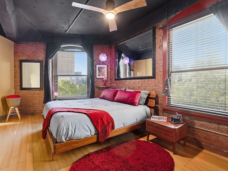 Fully-furnished mid-term rental available for 30+ days. Ideal for corporate travel, traveling medical professionals, or those needing a place to stay while moving or displaced from their home.

Built in 1906 as the Western National Bank, this remarkable structure was Fort Worth's first concrete skyscraper and proudly anchored the north end of the city's infamous Hell's Kitchen. For decades, it served as office space until its transformation in the mid-1990s into privately owned condominiums. With 20-inch brick walls and 15-inch concrete floors and ceilings, the building radiates history and character. Warm bamboo flooring, exposed red brick, and vibrant colors create a welcoming atmosphere that reflects its storied past. These walls truly have stories to tell. Come, stay with us and listen to what these walls have to say.

Downtown Fort Worth is characterized by its blend of historic western roots and modern urban sophistication, featuring a vibrant and walkable downtown core known as Sundance Square. This area is a hub for business, entertainment, dining, and cultural attractions, with a mix of historic buildings and modern skyscrapers. It's a dynamic district with a strong economy, a variety of leisure activities, and a lively, yet friendly, atmosphere.

Mid-term rental (30+ days). All utilities paid.