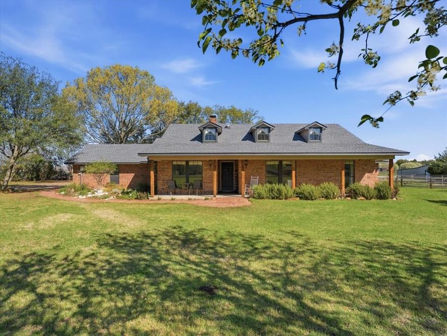 Welcome to this 3-bedroom, 2-bath home on over 2 acres in Tecumseh Park, offering space, privacy, and a country feel just minutes from the growth and conveniences of North Waxahachie—while still benefiting from county taxes. A full-length front porch built for rocking chairs welcomes you home, with outdoor living that continues to the diving pool with pergola, mature shade trees, and a 1,200 sq ft production garden ready for vegetables, berries, and flowers. The property also features a new roof, expansive mowed turf yard, 35×35 barn that could be adapted for horse stalls, and a separate two-story storage building, creating plenty of room for hobbies, projects, or small-scale homesteading. Inside, you’ll find cozy bedrooms that pair with a primary room that has his-and-hers walk-in closets, office space, and a garden tub! Property also has a spacious two-car garage with its own exterior entrance that could possibly convert to an apartment, guest space, or home gym!