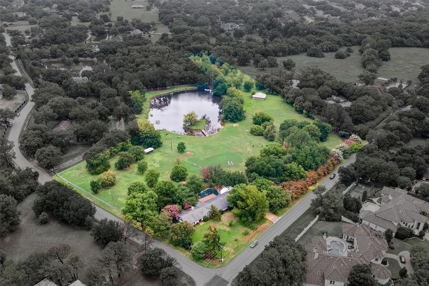 Rare opportunity to own close to 11 acres of beautiful land in Colleyville. Renovate the existing home or build your dream home. Land also could be divided into smaller lots but please confirm with city. There is also some flood plain on back of property as well as a flood zone in the very back corner. Value is in the land.  It is being sold for land value only.