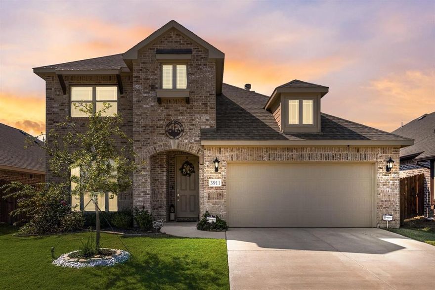 Welcome to this stunning 2022-built, 4-bedroom, 2.5-bath home offering 2,820 sq ft of modern living in the highly desirable Georgetown at Kings Fort community. Step inside to an airy open-concept floorplan featuring a bright living room with large windows and a cozy wood-burning fireplace. The gourmet eat-in kitchen includes a spacious island, custom cabinetry, double ovens, and a walk-in pantry—perfect for everyday living and entertaining. The private first-floor primary suite offers a spa-like retreat with a soaking tub, oversized shower, and dual vanities. Upstairs, you'll find a generous game room and three additional large bedrooms, ideal for family, guests, or a home office setup.
Enjoy outdoor living with a large fenced backyard and a covered patio, great for gatherings or quiet evenings. Home features include  abundant storage, full-size laundry room, and an attached 2-car garage. Located near schools, shopping, and dining with easy access to US-175, this home provides a quick, convenient commute to Dallas. Offering style, space, and modern comfort, this property is truly move-in ready and perfect for any lifestyle.