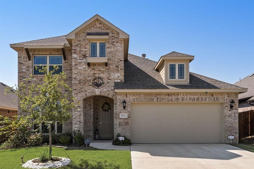 Welcome to this stunning 2022-built, 4-bedroom, 2.5-bath home offering 2,820 sq ft of modern living in the highly desirable Georgetown at Kings Fort community. Step inside to an airy open-concept floorplan featuring a bright living room with large windows and a cozy wood-burning fireplace. The gourmet eat-in kitchen includes a spacious island, custom cabinetry, double ovens, and a walk-in pantry—perfect for everyday living and entertaining. The private first-floor primary suite offers a spa-like retreat with a soaking tub, oversized shower, and dual vanities. Upstairs, you'll find a generous game room and three additional large bedrooms, ideal for family, guests, or a home office setup.
Enjoy outdoor living with a large fenced backyard and a covered patio, great for gatherings or quiet evenings. Home features include  abundant storage, full-size laundry room, and an attached 2-car garage. Located near schools, shopping, and dining with easy access to US-175, this home provides a quick, convenient commute to Dallas. Offering style, space, and modern comfort, this property is truly move-in ready and perfect for any lifestyle.