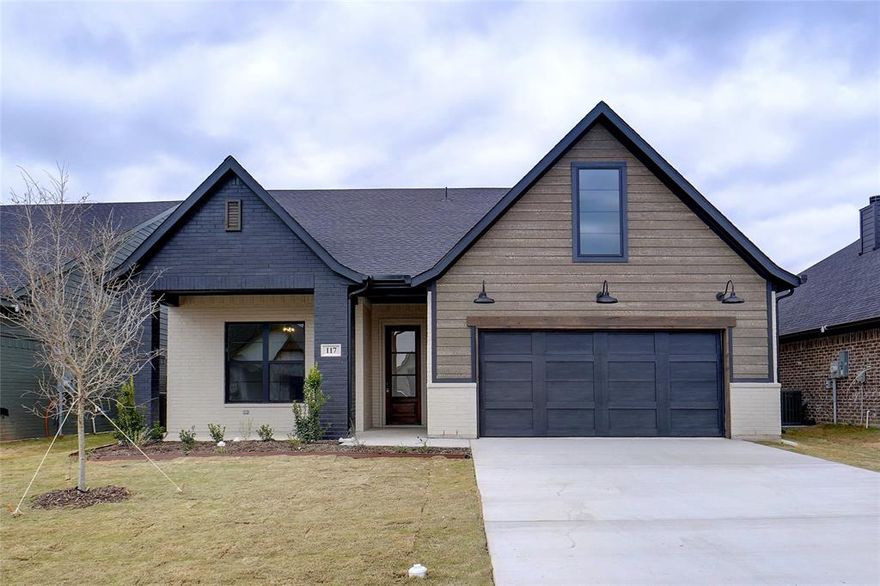 Looking for that perfect home that fits all your family needs this is it! Step inside to an open-concept floorplan filled with natural light, stylish finishes, and a chef’s kitchen featuring granite countertops, custom cabinets, and stainless appliances.  This amazing 2665 s.f. DoubleRock home offers 4 bedrooms and 3.5 baths ideal for families and flexible living complete with an in-law suite. Two bedrooms on the main level and two upstairs. Upstairs also hosts a spacious game room or second living area plus a study nook. Open floorplan with designer touches throughout. Granite countertops, custom cabinetry, stainless steel appliances, upscale tile and light fixtures. Built for comfort and efficiency. Whether you’re entertaining in the open living-kitchen area, relaxing in the upstairs game room, or enjoying quiet time in the in-law suite, this home adapts beautifully to modern family life. The smart layout and upscale finishes give you both luxury and practicality—everything in a brand-new build without the wait! Enjoy the exterior features of sod and a full irrigation system. Foam insulation, gutters, TRANE HVAC and more! Ceiling fans in all bedrooms!  Community-friendly amenities: playground, splash pad, walking trails and sidewalks encourage an active lifestyle. REFRIGERATOR INCLUDED!! Home has been virtually staged so you can see the potential.