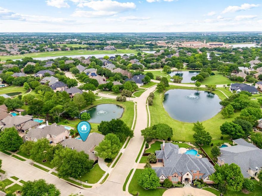 EXQUISITE REMODEL with high-end finish-outs and designer details and POND VIEWS! Dramatic light fixtures, a 15 foot kitchen island with quartzite, 60 inch built in subzero fridge, chef grade GE Monogram range and working pantry are just some of the features that make this single story 4 Bedroom ALL WITH ENSUITE baths so special. The double sided fireplace in office and living room overlooking the pool and pond make for gracious living and working. Natural colored oak hardwoods flow from room to room. The primary suite has a luxurious bath and customized closet. No expense was spared in any of the renovations! Covered patio and NEWLY REMODELED pool and spa overlooking two of the 7 ponds in Wellington Point making a lovely backdrop. There is also a full guest bath accessible from pool. Upstairs is only a game room and half bath. The circle drive and deep 4 car garage (1 with electric vehicle charging outlet) and the other with a Texas basement, provide enough space for family and friends. This is an absolute MUST SEE! Stonebridge Ranch master-planned community offers pools, tennis & pickleball, multiple parks, 20 miles of trails, catch & release ponds and 14 playgrounds! This neighborhood is an ideal location within a short drive to downtown McKinney, Frisco and PGA!