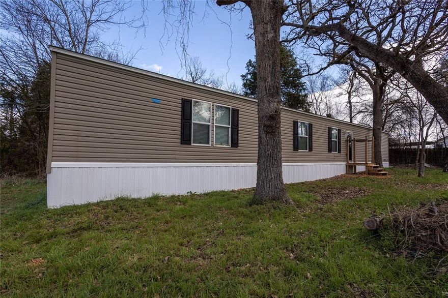 Investor Opportunity near Cedar Creek Lake!
Discover the potential of this like-new single-wide mobile home nestled on a small lot in Cherokee Shores at Cedar Creek Lake. With the home already secured and new skirting installed, some of the exterior setup has been completed — giving you a solid head start on your next project.

The interior offers a clean, well-maintained space ready for your finishing touches. Whether you're looking to create a weekend lake retreat, a rental investment, or a resale opportunity, this property presents incredible potential at an attractive entry point.

Please note: utilities and sewer are NOT currently connected — there is no power or water hooked up. Property is being sold AS IS.

This is a cash-only sale and is ideal for investors or buyers ready to move quickly and capitalize on the opportunity.

Enjoy access to Cedar Creek Lake amenities and the peaceful lake-area lifestyle — all at an affordable price point.

Don’t miss your chance to turn this property into something special!