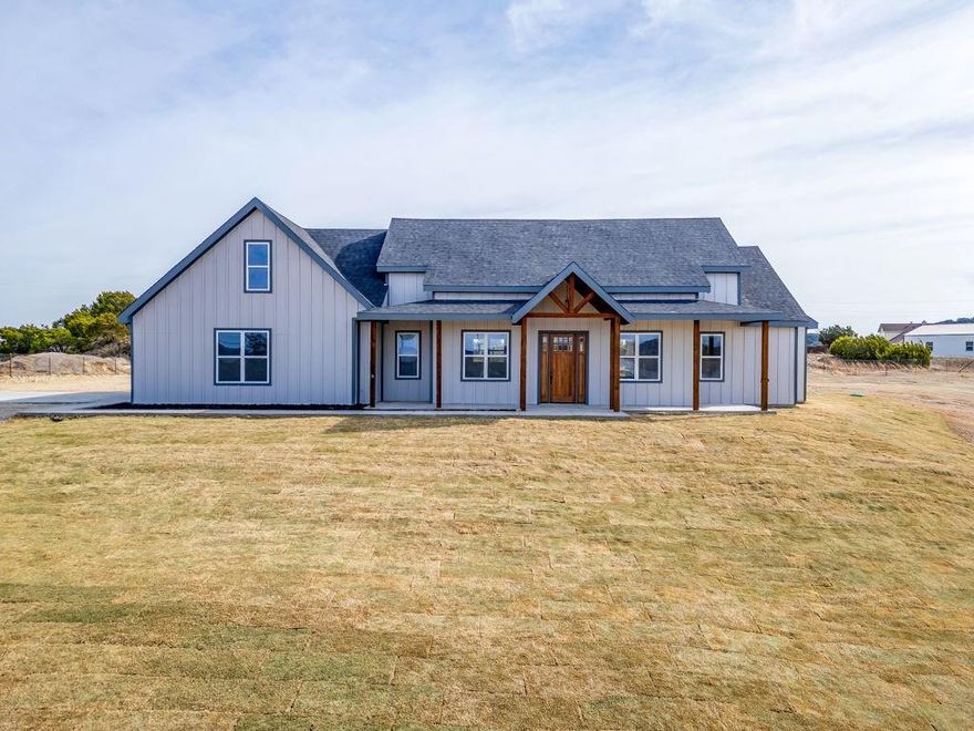 Located just 5 miles from the charming town square of Glen Rose, this stunning 4-bedroom 4 bath home blends modern farmhouse design with spacious country living. No HOA! Step inside to an inviting open concept featuring abundant natural light and storage space galore. Enjoy the generous walk-in pantry and beautifully designed butler's pantry complete with a built-in beverage fridge. The kitchen offers sleek quartz countertops and matching GE appliances, including a fridge! Retreat to your primary bedroom to relax in front of your private fireplace and enjoy the spacious ensuite bathroom and closet of your dreams. Designed for indoor outdoor living, the back patio is plumbed for a future outdoor kitchen or bar and backyard is clear for a pool, making it easy to create your dream entertaining space. Set on a 1.6 acre lot, enjoy the peace of wide-open space while still being minutes from town. Comes with a 1-2-10 home warranty.