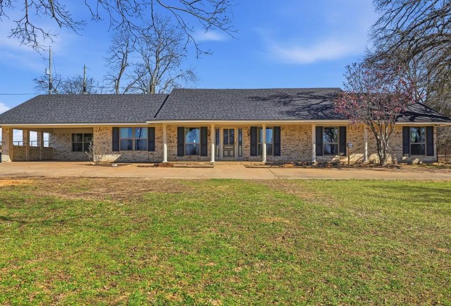 Beautiful 24.6 acre tract featuring a well-maintained spacious 3704 sq ft open-concept 3-2 home with living room, media room and sun porch. Perfect for those seeking living close to town with livestock space.

Rare opportunity to own approximately 24.6 acres featuring a spacious 3,704 sq ft home. This unique property offers the perfect blend of privacy, convenience, and potential.
The residence provides generous living space with ample room for entertaining, family living, or multi-generational use. An open-concept 3-2 home with living room, media room, and sun porch. A concrete storm shelter provides added peace of mind.
The acreage offers endless possibilities - whether you envision recreational use, livestock, future development, or simply enjoying wide-open space while remaining close to town amenities.
Properties of this size and location are seldom available. Premier property in Winnsboro, Texas. Schedule your private showing today.
Property highlights:
• Fully fenced & cross fenced with ponds on three sections
• Working pens
• Utility Barn
• Feed Barn
• 3,000 sq ft custom two bay metal building with mezzanine, 30 ft lean-to and two bay carports. Utility sink with hot water.
• Improved pasture with established Bermuda & Bahia grasses ideal for horses or cattle grazing
• Custom underground concrete storm shelter
• Concrete circle drive with concrete patios and sidewalks
• Pipe fence surrounding home
• Home has new roof, new windows, & freshly painted
• Updated natural gas lines from meter throughout home
• New sewer lines from house to city sewer connect
• Updated kitchen appliances
• Updated HVAC (natural gas heat with electric air)
• Updated electric hot water heater

All furniture contained in these pictures is virtually staged and the house is currently empty