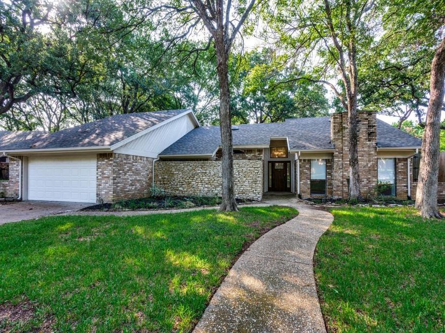 Modern Elevation with Stunning Custom Updates! You will immediately be impressed beginning at the stained front door, the soaring 2-story foyer, vaulted ceilings in the living room along with the floor-to-ceiling stone fireplace, fresh coat of paint, gorgeous wood-look & porcelain tile, the newly added baseboards, the beautiful KITCHEN with shaker style cabinet facings, granite countertops, brushed nickel plumbing and light fixtures, and a gameroom with a cedar closet that could double as a 4th BR! The Primary Suite with En Suite Bath includes dual sinks in vanity, granite counters, gorgeous tile behind the freestanding tub & a STUNNING shower! Incredible JnJ bath between secondary spacious BRs with W-I closets