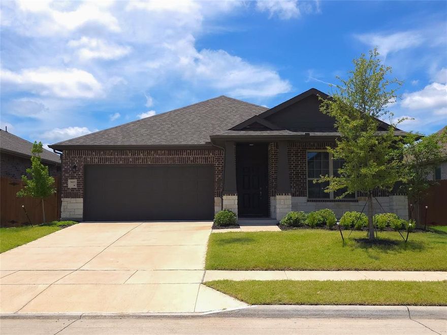 Built by HistoryMaker Homes - Ready Now! ~ If you're seeking a place to call home that combines thoughtful design, luxurious finishes, and a wealth of recreational opportunities, this is the perfect match for you. Discover this open-concept layout that seamlessly blends convenience and style. The open kitchen takes center stage with an oversized island, perfect for preparing meals or entertaining friends and family. A chef's dream with 42 espresso kitchen cabinets, Granite countertops adorned with a tasteful ceramic tile backsplash add a touch of opulence, turning every meal preparation into a delightful experience. The rich, wood plank tile flooring throughout the living area exudes elegance. The primary bath is a luxurious retreat, featuring dual vanities with double sinks, a serene garden tub, and a separate shower. Outside, the community's master-planned amenities beckon you to enjoy a life of leisure and enjoyment.
