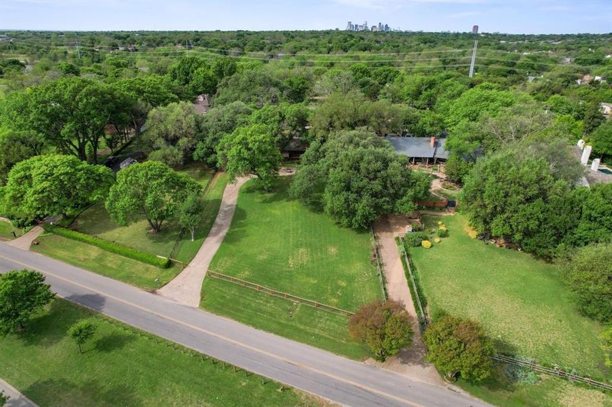 Once in a lifetime opportunity now available directly on the front row of W Lawther Dr at the iconic White Rock Lake in East Dallas. With a full 1.120 acres and an elevated build site overlooking the water this one of kind property provides unlimited options for the custom estate of your dreams. Just imagine... Coffee on the porch in the morning, wine on the patio in the evening and direct trail access throughout the day, this truly is resort style living in the heart of the city. For those interested in a more modest approach the original Charles Dilbeck designed home still stands among numerous mature trees and would make the perfect mid-century modern remodel at nearly 4K square feet. As an added feature Wendy Ln runs through the rear of the property providing a secondary access point to the homesite allowing for even more flexibility during the architectural process. This truly is an incredibly special opportunity to craft a legacy estate in one of the area's most desired neighborhoods where the hustle of urban life blends peacefully with the natural setting unlike any other part of the Metroplex.