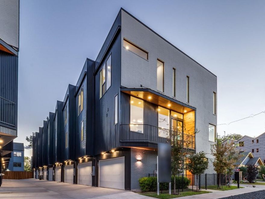 The new modern condo development is located in the heart of the Bishop Arts District. Features 18 modern condos, designed by AIA award-winning Architects Far + Dang and built by Cobalt Homes. Units range from 2,150 to 2,281ft, and features clean modern interiors, expansive rooftop decks, open floor plans, tall ceilings, Bosch stainless steel appliance package, solid-oak hardwood floors, quartz countertops, solid-core doors, Nobilia soft-close cabinets, tankless water heaters, smart features including wifi-enabled garage, smart door lock, a doorbell camera, Ecobee smart thermostats, security systems, & relaxation-inspiring five-fixture primary baths with double shower heads. Units also offer walk-up courtyards with grass and 2nd-floor balconies, with quick access to I-30 and I-35. Located 10 mins from Trinity Groves and Downtown.
