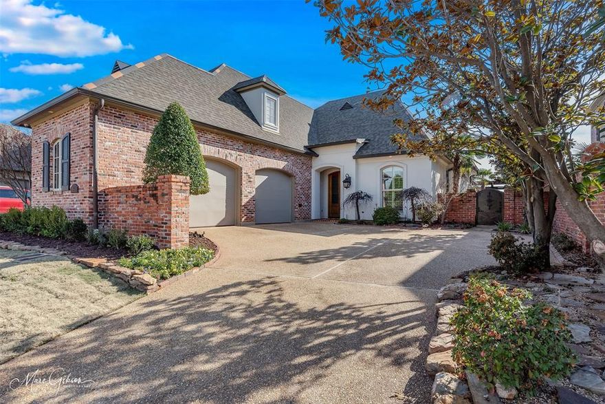 This stunning 3-bedroom, 2-bathroom home with an office is nestled in a desirable gated community, offering both privacy and convenience to everything you need. Owner recently updated kitchen, laundry room and office counters to Quartz!  Featuring gorgeous hardwood flooring, elegant tile, the kitchen flows seamlessly into the living area, making it perfect for entertaining. A separate dining space adds a touch of elegance for formal meals. The laundry room is thoughtfully designed with ample storage and counter space. Upstairs, a versatile bonus room awaits – ideal as a bedroom, playroom, or game room. The primary suite is large and open with lots of natural light and a door to the patio area. The primary bathroom has everything you need with a jetted tub, dual sinks on separate vanities, walk in closet and a tiled walk in shower. Step into the private backyard oasis, complete with lush landscaping and a built-in grill for outdoor cooking and gatherings. This home combines functionality and beauty in a prime location.