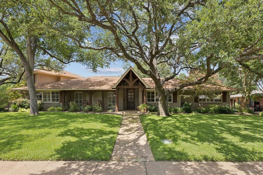 Meticulously maintained in desirable Eudora Estates on oversized lot with inviting front covered seating porch, grand FOYER, arched doorways and custom features throughout. Generous size FORMAL DINING at front of home comfortably accommodates a large dining table, decorative chandelier, recessed lighting, tray ceiling and appealing faux fireplace.  Eat-in KITCHEN w BREAKFAST BAR, stainless appliances, granite counters, tile backsplash, 6-burner Thermador gas cooktop, vent, double ovens, dishwasher & microwave, built-in Jenn Aire refrigerator, center island w storage, walk-in pantry, Butler's pantry w custom cabinets and wine chiller. BREAKFAST w wall of windows to maximize natural light, overlooks sprawling backyard & pool. OFFICE at front of home with wall of windows and built-in bookshelves w storage drawers. FAMILY room at rear of home boasts decorative wood beam, oversized stone gas-starter fireplace, built-in entertainment cabinets, rear access doors and windows with motorized shades with views of pool and backyard. PRIMARY ensuite with abundance of natural light overlooks backyard features granite counters, separate vanities, linen closet, ceramic tile, walk-in shower w glass door and panels, soaking tub w large window above, and walk-in closet. Upstairs boasts 4th BEDROOM w private full BATH and add'l LIVING. LAUNDRY w utility sink, storage closets, and room for second refrigerator. MUD room w wall of custom built-ins. Inviting private backyard features expansive heated diving POOL and spa, wrought-iron fence, custom wood arbors, ornatmental trees, and custom stone fire pit perfect for entertaining. Notable features include sculpted hardwood floors, vaulted ceilings, wood shutters, motorized shades, built-in bookcases, recessed lighting, alarm system, sprinker system, roof replaced in 2023, Rinnai tankless water heater, exterior lighting, mature landscaping, gated driveway, and so much more.