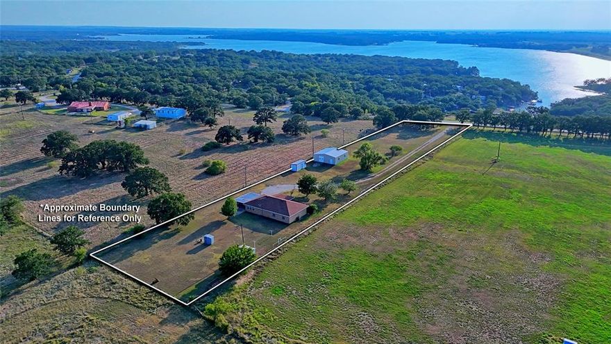Unmixed small acreage just outside Nocona city limits. This property offers ideal location with secluded views in every direction. Just the right amount of bunched tree coverage to give all the privacy a home could need. Pipe fence entrance leads up the dell to the 3-bedroom 2 full bath residence. Wood-like flooring lines the simple layout of the openness of the home. Welcoming area when you come in that could be used as a formal dining or sitting area. Peek through wall leads into the den or main living space. Plenty of room for all the furniture. Brick focal feature for any idea. Petite breakfast nook that ties right into the galley style kitchen. Custom cabinets line the walls above all the working counter space. Smart design utility room with plenty of space for a full-size freezer & additional storage. Loads of windows for natural light. Main bedroom is spacious & has its own private bath. Two additional bedrooms with ample closets. Hall bath with tub-shower combo to accommodate for all types of needs. Nice long hallway to give separation in the home. Attached carport for easy in & out. Extra coverage on the end for enjoyment is an ideal way to start the day or just hangout & relax after a long stressful day. Backyard is a perfect place for the kiddos to play, family gatherings, & pets to roam. Well thought out spray foam insulated shop with all things in mind. Home business, storage, workshop, or great place to entertain. Extra storage unit & lean to already in place. Propane gas line run to house for a space heater but is currently capped off. Perimeter barbed wire fencing. Pipe gate entrance can be locked up when the need arises. Short drive to public boat ramp on Lake Nocona. Drive to Nocona easily for all your needs, shopping, year-round events, eateries, golf course, hospital, & pharmacy. Scenic drive to Oklahoma Casinos. Enjoy wineries in the area. Turn back the pages & come enjoy the simple country living this property has to offer.