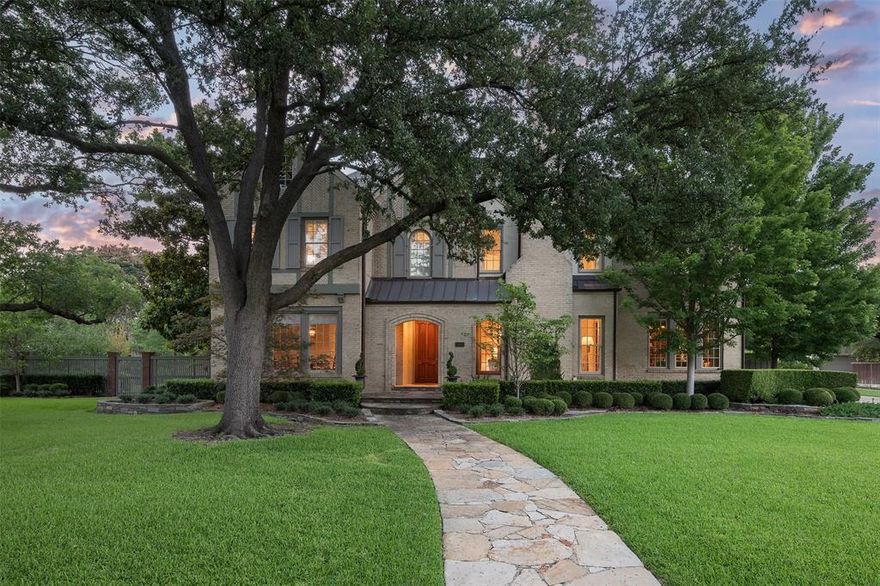 This charming UP home delivers comfortable living w 10ft+ ceilings, indoor-outdoor entertaining space, & updates throughout. The house includes 5,086 sqft on an oversized 114x150 corner lot w 2 sep outdoor spaces. The front porch leads to the spacious entry, flanked by formals, office w wood paneling, family rm w exposed wood beams, fireplace & wet bar, & a large chef’s kitchen w SS gourmet appliances, coffee bar, butler’s pantry & French doors opening to both sides of the backyard. The 2nd floor inclds the primary suite w fireplace & large closet, & marble bathrm w walk-in shower & free-standing tub. 3 additl. en-suite bedrms on the 2nd flr, & a 3rd floor with playrm-5th bedrm. Private guest quarters-playrm w full bath is located over the 2-car garage. The expansive yard is perfect for entertaining & includes a pool & covered patio for outdoor dining on east side, & an open patio & large grassy area on west side. Conveniently located near Hyer Elem. & shops & dining in Preston Center.