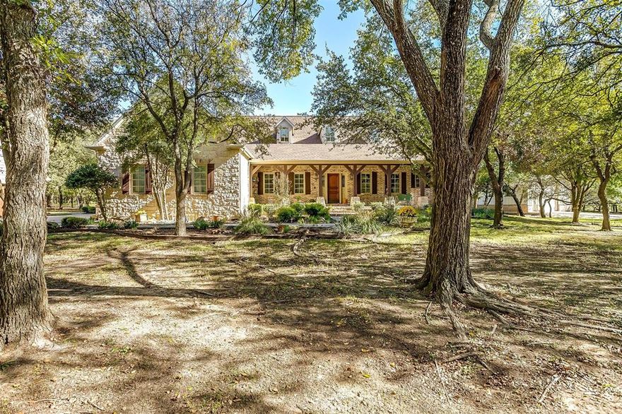 Picturesque country estate on 5+ AG EXEMPT, serene acres in Argyle ISD. Gourmet kitchen w oversized island, new Thermador double ovens, large WI pantry & coffee bar. Grand living room w vaulted beamed ceiling. Tons of natural light & hand scraped hardwood floors. Primary bedroom down w sitting area & custom closet. 3 add't bedrooms on 1st floor all en-suite bathrooms. Upstairs area is perfect flex room for media, workout or crafts. Enjoy sipping tea from your sunroom overlooking backyard & outdoor oasis w sparkling saltwater pool & pergola. New 30X50 dual door workshop w electric. Perfect for RV, ATV, boat. Detached 2 car garage w bonus upstairs w elec & water could easily be finished out into more living SF!