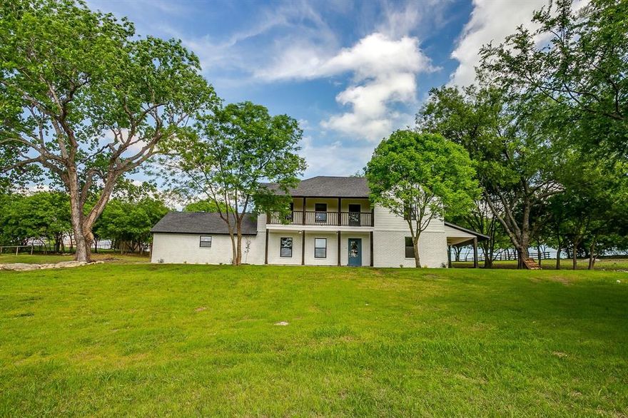 Nestled on a picturesque, tree-lined lot spanning nearly 2 acres, this stunning home offers charm, character, and modern luxury in equal measure. Aledo ISD! Perched gracefully atop a hill, the property has been completely transformed with a top-to-bottom remodel, blending timeless appeal with contemporary updates. Step inside to discover the beauty of wood-look tile flooring that flows seamlessly throughout the first floor, setting the tone for a warm and inviting space. The attention to detail is evident in every corner, with brand-new windows, cabinets, trim, and doors adding a fresh, crisp feel. Updated lighting creates a welcoming ambiance, while the fully upgraded plumbing, electrical, and HVAC systems provide peace of mind. The kitchen gleams with new appliances, making it both functional and stylish, a perfect space for everything from casual breakfasts to hosting memorable dinners. The thoughtful upgrades throughout make this home truly move-in ready. Opportunities like this are rare... don’t miss your chance to own a fully remodeled home on a lush, expansive lot. This is more than a house; it’s your next chapter waiting to unfold!