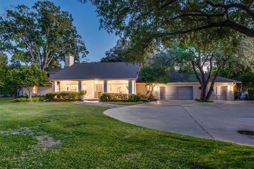 In a park-like setting of 1.02 acres on prestigious cul-de-sac, this charming 1.5 story Austin stone home offers over 7000 sq.ft. of living space with four bedrooms down, one bedroom and bath up; 4-5 living areas; Gorgeous grounds with soon to be newly re-plastered, heated Pool, Sports Court and Guesthouse.  4-5 Living areas include Formals; Den; Media-Game Room (or 5th bedroom.).; Large Office-Sitting Room. adjacent to Master down with brand new updated His and Hers baths; including free-standing tub & quartz countertops;  Exercise-Yoga Room; 4 WBFP; Separate Guest House (950 sq.ft.), updated in 2021 with 2 bedrooms. & Kitchen + 2-car attached garage. This unique property provides an opportunity to leverage the existing house into something even more special - resting on 1 acre of prime land in Old Preston Hollow...just waiting for YOU!