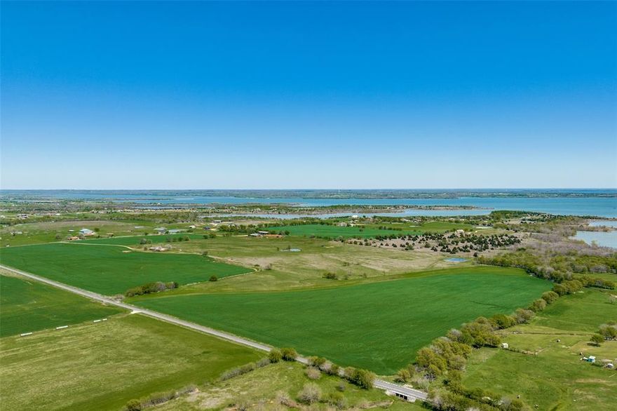 Experience the ultimate in countryside living, where 122+ breathtaking acres of rolling pastures and wide open spaces create a truly unforgettable setting. Perfectly positioned on a picturesque hilltop, this remarkable property includes sweeping views of the surrounding countryside, nearby Lake Ray Roberts public hunting land, and direct access backing up to Corps of Engineers land, providing both privacy and an unmatched natural backdrop. The property is complete with a pond, mature trees, and abundant space to make your vision a reality. A spacious 3,544 sqft single-story home with 6 bedrooms and 3.5 baths sits atop the hill, offering plenty of room for gatherings while allowing the land itself to truly take center stage. Rarely does an opportunity like this come along, your own private retreat with limitless potential. Don’t miss your chance to own a one-of-a-kind piece of Texas paradise.