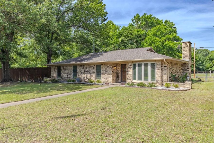 Welcome home! Tucked away at the end of a quiet dead-end street on Arapaho Rd, this charming 4-bedroom, 2-bath brick home offers space, privacy, and endless potential. Situated on over half an acre—including an additional lot—this property provides plenty of room to spread out, garden, or create your ideal outdoor retreat. Inside, the inviting family room serves as the heart of the home, featuring a stunning floor-to-ceiling brick fireplace flanked by built-in storage, adding both character and functionality. With a spacious layout and solid construction, this home is ready for your personal touch.
Whether you're looking for a place to settle in or grow into, this home offers the perfect blend of comfort and opportunity, with room to make it your own over time. Enjoy the peaceful setting while still being conveniently located near everything Commerce has to offer.