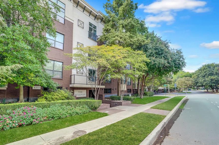 Super well-maintained condo near the Medical District, Uptown, Downtown, Oak Lawn, SMU, and Love Field. This perfect lock and leave contemporary style unit is efficiently designed with an open floorplan. The island  kitchen is very spacious, with breakfast bar, granite, stainless steel, built-in microwave, tons of cabinets, and a pantry. The combined living-dining area is brightened by the wall of windows leading to a covered balcony, as well as by the beautiful light wood flooring. The primary suite includes a large en-suite bath with dual sinks, separate shower and garden tub, and large walk-in closet. This unit has just been freshly painted, and includes refrigerator, and full-sized washer and dryer. Two secured parking spots, one covered, one not..