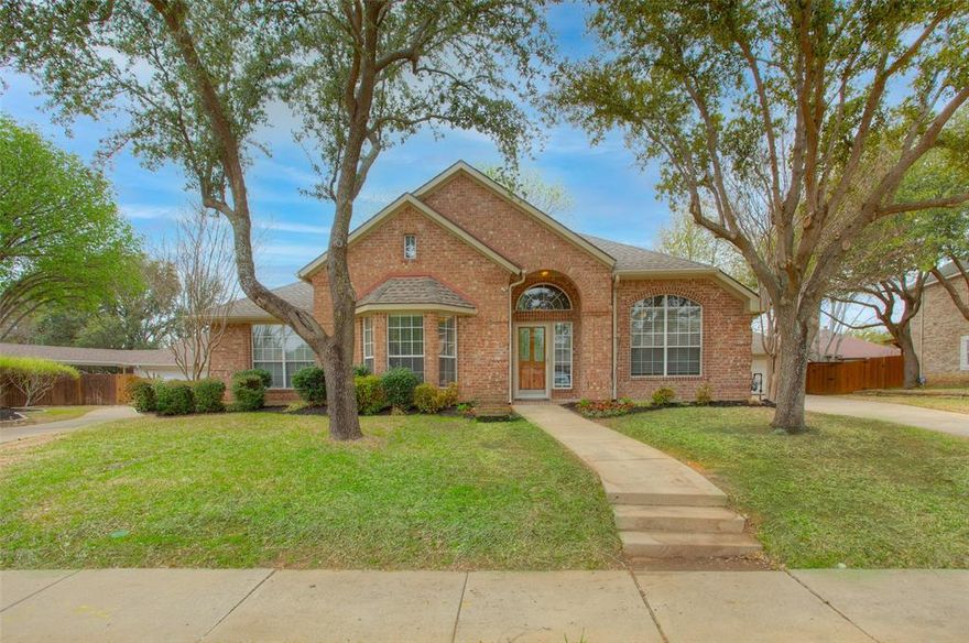 One story single family home with large pool, including a diving rock and waterfall in the sought after Keller ISD. Updates include class 4IR roof in 2017, capped cedar fence. New Furnace in 2018 and 10 new windows and French doors in 2021.  Surround sound system added to second living area. Fiber glass insulation was removed in 2022 and all vents sealed and clean energy efficient insulation installed. Sprinkler system in front and side rear yard, pool resurfaced with pebble-tec and converted to salt water.  Garage has built in air compressor for your pool toys.  All of this and more in a quite neighborhood and walking distance to the trail.  This is a must see home with open concept living and a double sided fireplace.