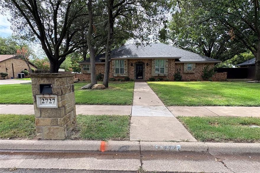 WONDERFUL 4 BD-2.5 BTH, 2,716 sq ft home on Amherst Dr., in southern Wichita Falls. NO FLOOD ZONE and NO HOA! Quiet neighborhood with very little through traffic. With many recent exterior and interior upgrades, the home is in excellent condition and ready for a new owner.

The brick exterior has stone accents around the windows and doors; the class 4 roof was installed in 2019. Both the front and back yards are irrigated, with landscaped beds and mature oak trees. The back yard has a privacy fence around it, a new in-ground storm cellar and a large back porch with a custom built cedar pergola. The home sits along a city alley on its east and south sides, providing easy access to the two car garage around back.

The interior has tiled floors throughout with carpet in two of its bedrooms; all the windows have plantation shutters. The living room has a wood burning fireplace and a 12 ft vaulted ceiling with skylights; a small wet bar is in this room too. The home has two dining areas – a formal dining room & a breakfast nook off the kitchen. The L shaped galley kitchen has upgraded Whirlpool appliances and lots of cabinet space. The nook has a large window seat and attached coffee bar.

The master suite has a spacious bathroom, with separate his and hers vanities & walk-in closets, additional linen closet and toilet area. The walk-in shower allows standing room and has a built-in seat with its own wand. Bedrooms #2 & #3 share a Jack-and-Jill full bathroom. Bedroom #4 has easy access to the guest half bath in the hallway, which has plumbing for shower if needed; this bedroom is off of the main living room and would make a perfect den or game room too.

Estimated property taxes (without exemptions) are $7,399.80.

LIST PRICE: $410,000