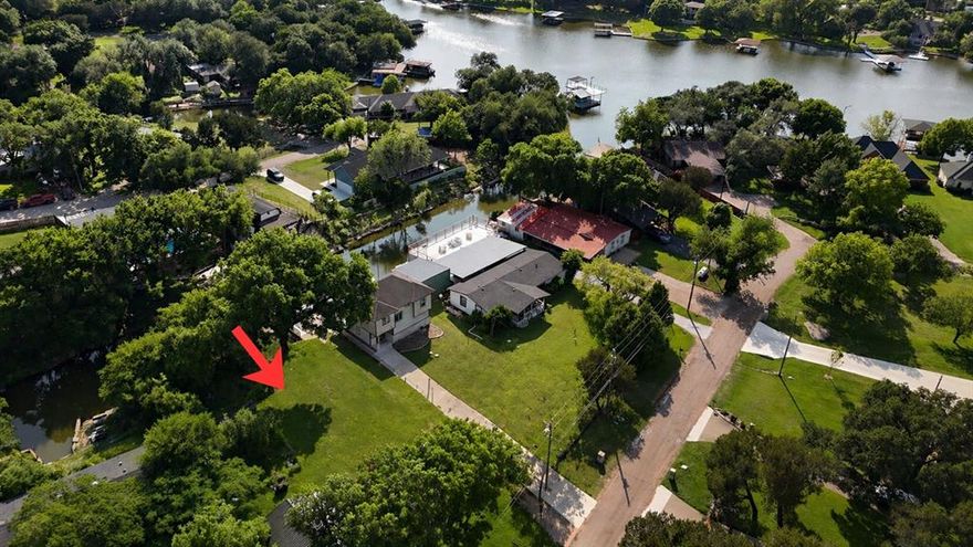 Rare opportunity to own a prime .22-acre waterfront lot in a desirable location on Lake Granbury. This property offers the perfect setting to build your custom lakefront home, with existing home scheduled to be removed prior to closing. Enjoy the gorgeous shade trees, tiered stone lakeside patio and elevated deck setup that gives you multiple ways to experience lake life.
Enjoy direct water access, peaceful surroundings, and the flexibility to design exactly what you want without the limitations of remodeling. Whether you're looking to create a full-time residence, weekend retreat, or investment property, this lot offers endless potential.
Conveniently located with easy access to local amenities, dining, and entertainment in the Best Small Town in America