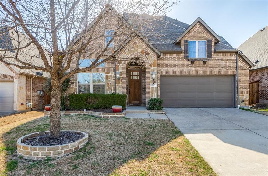 This exceptional home is packed with high-end upgrades and plenty of charm! Featuring gorgeous wood floors, a spacious open kitchen with granite countertops, white cabinetry, a massive island, a 5-burner gas cooktop, stainless steel appliances, and a stylish bar area with a wine fridge.  Eye-catching shiplap accent walls and decorative lighting add character. The extended patio provides the perfect spot to relax and enjoy the beautiful backyard. Versatile flex room with French doors can serve as a fourth bedroom or a private home office. Upstairs, you'll find a cozy living area along with two generously sized bedrooms and a full bath featuring double sinks. Located in the vibrant Trinity Falls community, residents enjoy miles of scenic walking and cycling trails, a resort-style pool, a dog park, serene lakes for fishing, and exciting monthly events for all ages. Don't miss the chance to call this incredible home and neighborhood yours—schedule a showing TODAY!