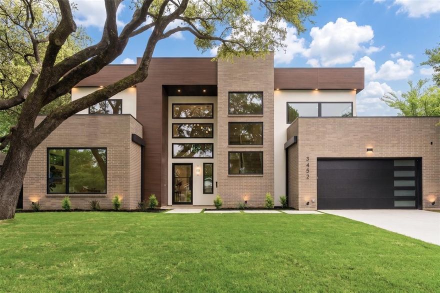 This sprawling modern retreat built by the Avant Group is a MUST-SEE. Thoughtfully curated to embody elegance and modern sophistication, this 6-bedroom, 6-bathroom home includes the hard-to-find 3 en-suite bedrooms on the first floor, providing a versatile footprint for families or multi-generational living. Stepping inside, you are welcomed by the dramatic 20-foot ceilings, drenched in natural light throughout the foyer and living room. Culinary excellence defines the kitchen, which dazzles with polished grey quartz, a terrazzo-style marble surround and hand-made custom cabinetry in a refined mix of stained white oak and warm tones, that flow into the oversized butlers pantry. The expansive family room features a breathtaking floor-to-ceiling fireplace and massive sliding glass doors that open to a covered veranda and oversized backyard, perfect for a future pool while still leaving plenty of lush green space for play. Serving as a secluded sanctuary, the primary retreat boasts a spa inspired bath with porcelain tile, custom stained white oak cabinetry, a sleek freestanding soaking tub, and a massive, fully enclosed walk-in shower with a rainfall head. From there, enter the massive primary closet where your fashion goes to thrive. One of the downstairs bedrooms is staged as the office, but is ensuite to a full bath. On the opposite side of the home, you will find a wing perfect for a guest or in-law suite with a private door to the backyard. The second level expands the entertainment possibilities with a generous game room featuring its own wet bar, flanked by additional ensuite bedrooms. Built with the high standards youve come to expect from Avant Group, the home features Anderson windows, an over-engineered slab foundation with piers, 2x6 exterior walls with foam insulation for efficiency, and CAT-6E and speaker wiring. Comes with the trusted Maverick 1-2-10 Builder's Warranty.