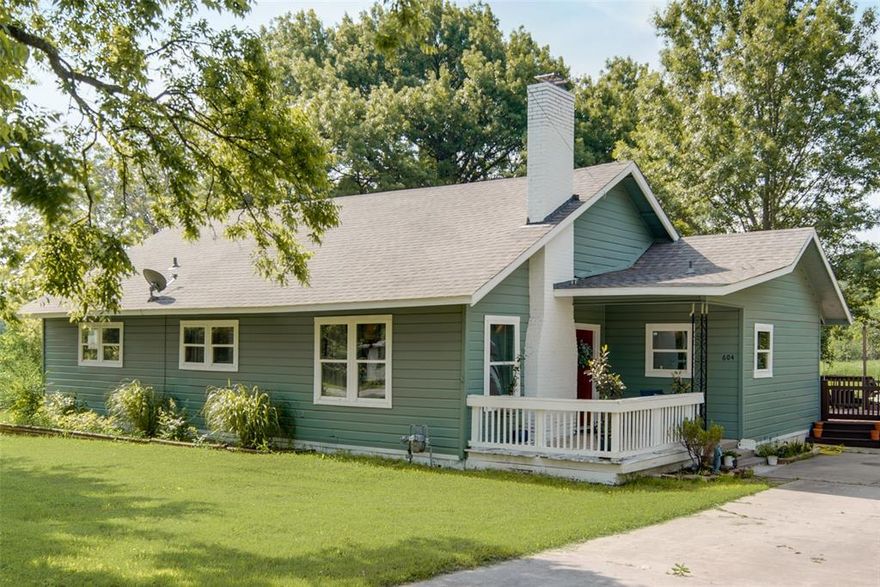 Bring your farm animals to the almost 10 acre property.  In the middle of town with a rural feeling. Walking distance to the High School. Adorable   3 Bedroom house 2 bathrooms.  Storage  Shed in the property.