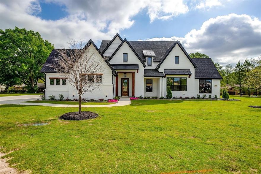 Located in the highly sought after Drane Estates is 2000 Cumberland Circle, the Blaire floor plan. This new construction home by Elmwood Homes features 4 bedrooms, 2.5 bathrooms, a 3 car garage and 2,719 square feet on 0.710 acre cul de sac lot. As custom as you could get without picking it out your self. Welcome to your dream home! This exquisite new construction boasts a range of elegant features and modern upgrades that will captivate your heart. With a striking exterior highlighted by 8-foot doors and a meticulously designed gutter drip line foundation, this residence combines functionality with style. Step inside to discover a grand entry with soaring vaulted ceilings that seamlessly flow into the spacious family room, creating an inviting atmosphere for both relaxation and entertaining. The chef’s kitchen is a culinary delight, featuring double ovens, top-of-the-line gas appliances, and ample countertop space for meal prep. Cozy up on chilly evenings by the impressive 72-inch gas burning fireplace that serves as the centerpiece of the family space. For those who love to enjoy the outdoors, the screened-in porch offers a peaceful retreat, perfect for sipping your morning coffee or unwinding after a long day. With a comprehensive irrigation system and attention to detail evident throughout, this Elmwood Homes masterpiece is not just a house; it's a place to call home. Don’t miss out on this exceptional opportunity in Corsicana. Schedule your tour today and experience luxury living at its finest!