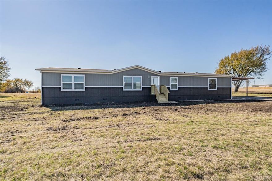 Welcome to your dream home! Set on a sprawling 2-acre lot, this property offers you the freedom and tranquility of country living with no HOA. 
As you enter, you'll be greeted by a carport and a decorative walkway that leads you into this well-maintained home. The open floor plan seamlessly connects the living room, Kitchen dinning room and family room, creating the perfect space for both relaxation and entertaining. Natural light floods through the windows, adding warmth and brightness to every corner. Step outside onto the 4x4 front or back deck, where you can enjoy your morning coffee. For those with horses, this property welcomes them with open arms. Plus, being located outside the City Limits means you can enjoy a peaceful environment while still having convenient access to nearby amenities. Home comes with manufacturer warranty. 

FHA, VA, USDA and Conventional Welcome!

All information is deemed reliable, buyer and buyers agent are responsible to verify all information