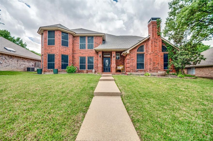 Welcome to this beautiful brick home zoned for highly sought-after Martin High School! This spacious and well-appointed home offers the perfect blend of comfort and functionality. Step into the inviting living room featuring soaring ceilings, abundant natural light, and a cozy wood-burning fireplace—creating a warm and welcoming atmosphere. The eat-in kitchen boasts stainless steel appliances, an electric cooktop, granite countertops, and beautifully painted cabinetry. The oversized primary suite is a true retreat, complete with its own fireplace and sitting area. The ensuite bathroom offers separate vanities, large shower, jetted tub, and a generous walk-in closet. Downstairs also includes a formal dining room and convenient half bath for guests. Upstairs, you’ll find a versatile secondary living area perfect for a game room or playroom, as well as three additional bedrooms providing plenty of space for family or guests. Step outside to your private backyard oasis featuring a huge covered patio with ceiling fan—ideal for entertaining—overlooking a sparkling pool and large yard. Located in a prime area with easy access to I-20 and just minutes from shopping, dining, and parks, this home truly has it all!
