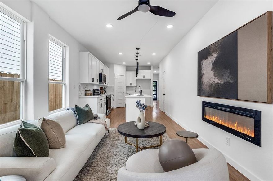 BUYER INCENTIVES AVAILABLE! Work with our preferred lender and receive 1.75% of the loan amount (up to $5,500) toward closing costs or a rate buy-down — helping lower your monthly payment from day one. Just 10 minutes from Downtown, 2321 Budd Street delivers the city lifestyle without sacrificing space, style, or flexibility. This brand-new construction offers a rare combination of thoughtful design and urban convenience—ideal for those who want to stay close to the energy of the city while enjoying the ease of a low-maintenance, lock-and-leave home. Inside, clean lines and elevated finishes set the tone. The main level features a modern kitchen with quartz countertops, a walk-in pantry, sleek cabinetry, and a large island that connects to a light-filled living and dining area—comfortable, curated, and perfect for everyday living or casual entertaining. Upstairs, three generously sized bedrooms give you options—whether you need a guest space, home office, or a quiet room to reset. One of the secondary bedrooms is oversized and versatile enough to serve as a second primary suite. The third floor is reserved for the primary retreat: tree-lined views, an oversized walk-in closet, spa-like bath, and a private bonus nook that’s ideal for a home gym, office, or creative studio. A fenced backyard, attached garage, and convenient second floor laundry room complete the home. All of this, just minutes from Downtown, Bishop Arts, Uptown, Deep Ellum, and several major highways. Flexible layout. Fresh design. Prime location. This one just makes sense.