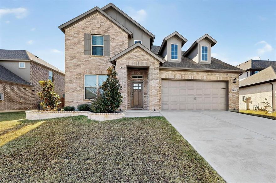 This home qualifies for a limited time lender paid 2-1 buydown at 4.99% with reduced monthly payments for the first 2 years and at no cost to the buyer or seller! Ask listing agent for more info! Welcome to your move-in-ready dream in the highly desirable Twin Hills neighborhood! This elegant two-story 2021 built home offers 4 bedrooms, 3 full baths plus a half bath, and 2,804 sq ft of thoughtfully designed living space.  Step inside and be greeted by soaring ceilings and abundant natural light. Featuring a formal home office or sitting room with stained barn doors, luxury vinyl plank flooring flows through the kitchen, breakfast nook and family room, seamlessly blending style with durability. The professionally designed kitchen is sure to impress with an oversized island, stainless steel appliances, a crisp white backsplash, and an open sightline into the family room create a welcoming and functional space for everyday living and entertaining. The owner’s suite is a serene retreat: the bay-windowed bedroom overlooks the backyard, and the spa-inspired ensuite features marble-look tile, double vanities, and an oversized shower. Upstairs, you’ll find a spacious game room—perfect for recreation, a media area, or flex-space to suit your needs. Outdoors, the large, landscaped lot is framed by an extended covered patio ideal for both play and low-maintenance hosting. Additional highlights include a two-car attached garage, smart-home wiring, walk-in closets, and community amenities such as greenbelt trails and easy access to parks, elite dining and shopping, Lake Arlington, Arlington Entertainment District, and highways.
Located in the well-regarded Mansfield ISD. Don’t miss your chance to call this stunning property home—schedule your tour today! Ping Pong Table and smart security system will convey with the property.