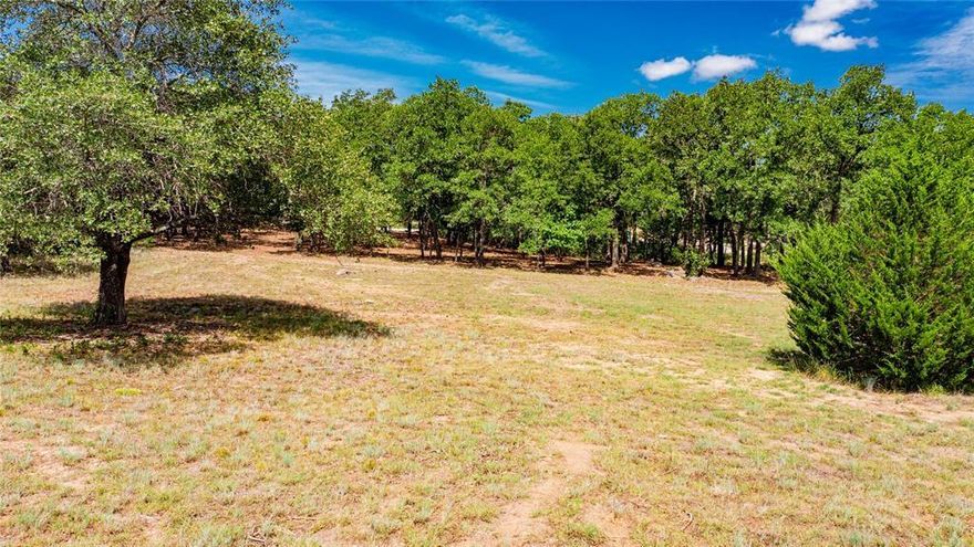 This beautiful, wooded, 2-acre lot nestled in Alvord, TX is the perfect location to build your forever home in a quiet, country living environment.  Enjoy the peace and quiet of country living with the convenient access to local amenities highlighted by the LBJ Grasslands, a sprawling 20,000+ acre public area featuring hiking, camping, fishing, hunting and horseback riding.  This property offers gently rolling terrain with lots of trees and a creek on the back of the property.  This property provides a perfect setting for someone looking for a tranquil setting in a beautiful community surrounded by nature.