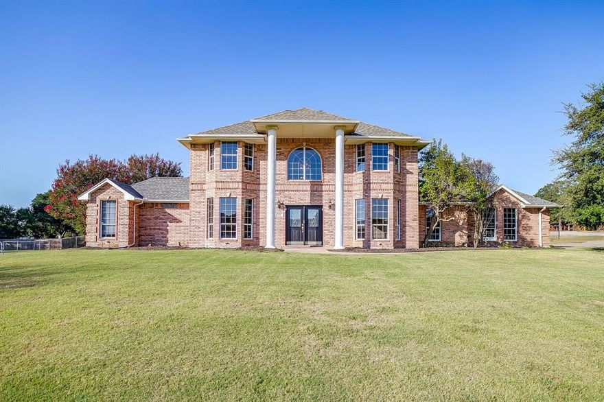 You’ve made it. Welcome home. Tucked away in one of Burleson’s most private and peaceful neighborhoods, this 3,791 sq. ft. colonial-style retreat on 1.23 acres gives you space to breathe, room to grow, and the comfort of country living —with all the modern conveniences just minutes away. From the moment you turn into The Summit, everything slows down. With just one way in and out, you’ll feel the peace of a quiet, close-knit community. No city taxes, no traffic noise—just the sound of birds, wide open skies, and the sense that you’ve finally found home. Inside, there’s room for everyone: 4 spacious bedrooms and 4 full bathrooms, including a private ensuite for guests or multigenerational living.Your oversized primary suite becomes a true escape, with its own private door leading straight to the patio and pool— perfect for early morning coffee or quiet sunset swims. The dedicated home office makes work-from-home feel like a luxury, while the upstairs bonus game room offers space to unwind, create, or play. The kitchen and bathrooms feel fresh and welcoming with newly painted cabinets and updated hardware, bringing in a touch of modern charm. Step outside and you’re already in your own personal retreat: a fully fenced backyard, gated pool area, and a large patio just waiting for BBQs, birthday parties, and lazy Sunday afternoons. And when you’re ready to tinker or take on a new project, your 24x40 workshop is ready—with 15-foot ceilings and dual 10x10 roll-up doors, it’s perfect for RV storage, a home gym, hobbies, or serious shop work. Thoughtful upgrades like a Rheem 80-gallon smart water heater, Ring security system, radiant barrier, solar attic vent, and a 3-car garage add ease and efficiency to your everyday. Here at the crossroads of Burleson and Mansfield, you’re perfectly positioned to enjoy the best of both cities—yet far enough to truly unwind. This isn’t just a home. It’s a lifestyle. And now, it’s yours.