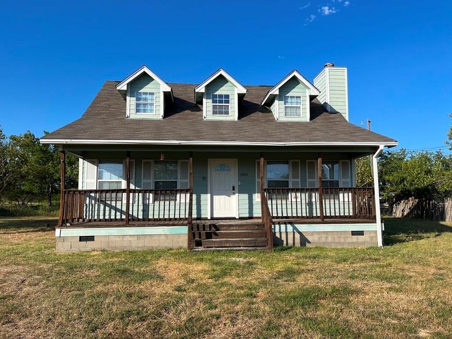 CHARMING, MOVE-IN READY HOME on 2.5 ACRES at a SUPER-AFFORDABLE PRICE!!!  This home features a large living room with FP which opens to a spacious dining area, a well-appointed galley-style kitchen with recent appliances, a sizeable first floor primary bedroom with an ensuite bath, 2 ample upstairs bedrooms with a substantial bath between them, and more!!!  Roof is new, and the remainder of the home has fairly recent updates.  The fenced 2.5 acres is rectantugular in shape and lends itself to many uses, such as gardening, 4-wheeling, raising livestock, and more!!!  There is plenty of room on this property to roam and expand.  Its location near Hwy 175 and I-20 make it convenient to all your employment, entertainment, medical, and other needs, with most essentials being available in Kaufman and nearby Terrell.  Do not hesitate on this unique property...View it today!!!