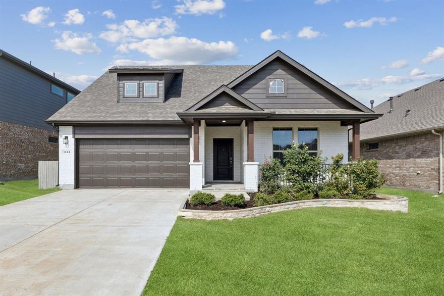 Located in the award-winning Pecan Square community and Northwest ISD, this beautifully updated 4-bedroom, 2-bath home offers modern comfort with timeless appeal. One bedroom features double doors, making it ideal for a private office or flex space. Recent upgrades include all-new ductwork, electrical system, roof & roof frame, 4-ton HVAC, tankless water heater, and all new appliances. The home showcases ceramic tile throughout, with carpet in two bedrooms and tile in the primary suite. Each bedroom is equipped with a ceiling fan, and the stainless steel refrigerator will remain. Step outside to a stunning extended covered patio with stamped concrete—perfect for entertaining. A Washington Commanders logo adds a playful touch - not a fan? Seller is open to options to update! Additional highlights include modern lighting throughout and a built-in safe in the primary suite. Pecan Square offers a resort feel lifestyle with all of its amenities. Residents love the gathering spaces and community events, multiple pools, playgrounds (for kids and dogs:), work-out facilities and covered pickleball and basketball courts, tennis courts, Amazon Hub, something for everyone!