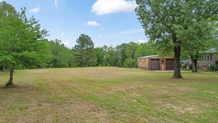 Photo 1 of 19 — 380 Timber Lakes Drive, Powderly, TX 75473