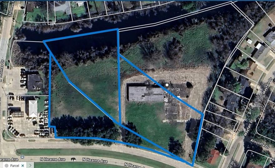 This property is actually in Bossier Parish.  Yes, that's correct.  It is in the Shreveport City Limits and Bossier Parish.  Please make sure you put all 3 parcel numbers, 155839, 122673  and 170448 when bringing the offer.  There was a building there but it has been removed. You have utilities right there on location so this will be easy for you.  This is on the service road of N Hearne for easy access, also.  This is a great potential property for your next commercial venture.  Flat land that is in an X Flood Zone per the maps.