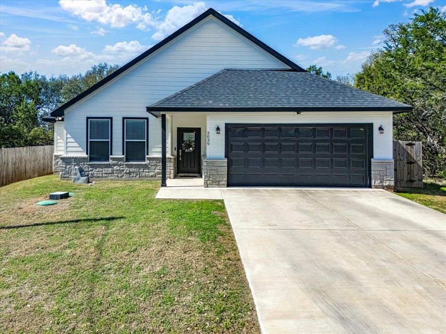 Welcome to this beautiful 3 bedroom, 2 bathroom home located in a desirable gated community in Granbury. Surrounded by gorgeous mature trees and just moments from the water, this property offers the perfect combination of privacy, recreation, and convenience. Inside, you will find a spacious open concept floor plan designed for comfortable living and easy entertaining. The living, dining, and kitchen areas flow seamlessly together, creating a warm and inviting space for hosting gatherings. Wood flooring throughout the home adds timeless style and durability, while the generously sized bedrooms provide plenty of space to relax and unwind. Step outside to enjoy the large backyard, offering endless possibilities for outdoor living, gardening, or simply enjoying the peaceful surroundings. Residents of this community enjoy access to excellent amenities including lake access, a community swimming pool, and basketball courts, all within the security of a gated neighborhood.

With its great price, beautiful setting, and access to lake living, this Granbury home is a wonderful opportunity you will not want to miss.