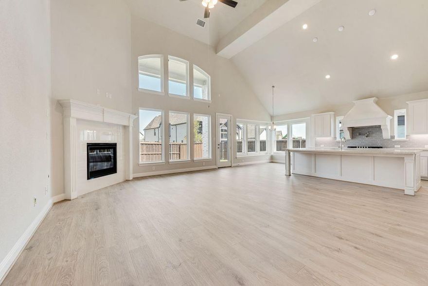 Stunning New Grand Home in South Pointe. This beautifully designed Grand Home is JUST COMPLETED, Mansfield’s premier master-planned community. Perfectly positioned on a spacious 0.23-acre lot with a 3-car garage, this home blends elegance, comfort, and thoughtful design in one of the area’s most desirable neighborhoods. Enjoy resort-style amenities including a pool, parks, greenbelts, scenic trails, and a state-of-the-art amenity center—all within top-rated Mansfield ISD.
Step inside to an open-concept layout that’s ideal for everyday living and entertaining. A soaring, vaulted family room connects to a large, covered patio featuring an outdoor fireplace, a gas line for grilling, and pre-wired speakers—perfect for gatherings. The double staircase with wrought iron balusters adds architectural charm, while 8' interior doors and stylish lever hardware elevate the interior.
The gourmet kitchen features Shaker cabinetry, Omegastone countertops, a 5-burner gas cooktop with custom vent hood, pot filler, double ovens, stainless steel appliances, and a full-bowl sink. Smart storage solutions include pots and pans drawers and a hidden trash pull-out. A formal living area offers flexibility as a home office or den, and a guest suite on the main level ensures privacy and convenience.
The primary suite is a private retreat with a freestanding tub, dual vanities, and a tiled glass shower. While upstairs, a spacious game room and a media room or children’s retreat, pre-wired for surround sound, offer additional space to relax and unwind.
Walk to area schools, with a new on-site campus planned soon. Built by an Energy Star Partner with R38 insulation, this home includes full builder warranties for peace of mind.