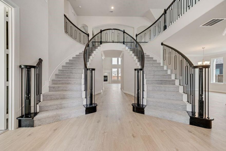 Stunning New Grand Home in South Pointe. This beautifully designed Grand Home is JUST COMPLETED, Mansfield’s premier master-planned community. Perfectly positioned on a spacious 0.23-acre lot with a 3-car garage, this home blends elegance, comfort, and thoughtful design in one of the area’s most desirable neighborhoods. Enjoy resort-style amenities including a pool, parks, greenbelts, scenic trails, and a state-of-the-art amenity center—all within top-rated Mansfield ISD.
Step inside to an open-concept layout that’s ideal for everyday living and entertaining. A soaring, vaulted family room connects to a large, covered patio featuring an outdoor fireplace, a gas line for grilling, and pre-wired speakers—perfect for gatherings. The double staircase with wrought iron balusters adds architectural charm, while 8' interior doors and stylish lever hardware elevate the interior.
The gourmet kitchen features Shaker cabinetry, Omegastone countertops, a 5-burner gas cooktop with custom vent hood, pot filler, double ovens, stainless steel appliances, and a full-bowl sink. Smart storage solutions include pots and pans drawers and a hidden trash pull-out. A formal living area offers flexibility as a home office or den, and a guest suite on the main level ensures privacy and convenience.
The primary suite is a private retreat with a freestanding tub, dual vanities, and a tiled glass shower. While upstairs, a spacious game room and a media room or children’s retreat, pre-wired for surround sound, offer additional space to relax and unwind.
Walk to area schools, with a new on-site campus planned soon. Built by an Energy Star Partner with R38 insulation, this home includes full builder warranties for peace of mind.